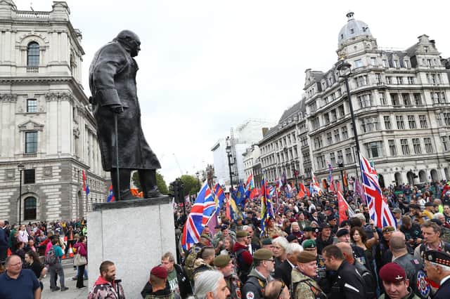 Demonstrators gathered in Parliament Square in London as part of a 'Rolling Thunder' protest in support of Soldier F who was being prosecuted for the murder of two men, James Wray and William McKinney, shot during a civil rights demonstration in Londonderry on Bloody Sunday in 1972. (Photo: Aaron Chown/PA Wire).