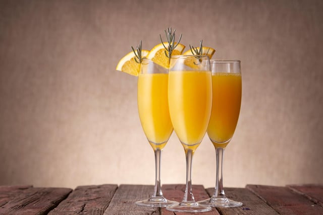 It doesn't get any easier than making a Mimosa - simply half fill a champagne glass with sparkling wine, then add orange juice until the glass is full. No garnish is needed - but you can also ways pop a slice of orange on the rim.