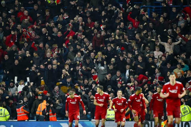 Aberdeen fans celebrating at Ibrox. Picture: SNS