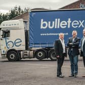 Bullet Express co-founders Gary Smith (left) and David McCutcheon flank the company’s new CEO, John McKail, who led the MBO. Picture by Jamie Simpson