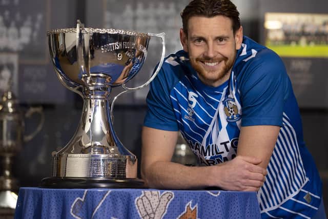 Kilmarnock defender Ash Taylor pictured with the League Cup trophy before he attempts to end his Hampden heartache against Celtic in this weekend's semi-final. (Photo by Alan Harvey / SNS Group)