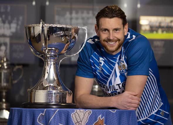 Kilmarnock defender Ash Taylor pictured with the League Cup trophy before he attempts to end his Hampden heartache against Celtic in this weekend's semi-final. (Photo by Alan Harvey / SNS Group)