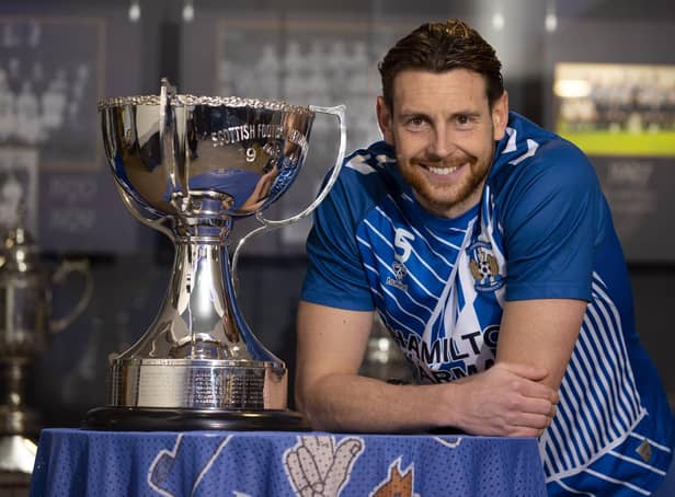 Kilmarnock defender Ash Taylor pictured with the League Cup trophy before he attempts to end his Hampden heartache against Celtic in this weekend's semi-final. (Photo by Alan Harvey / SNS Group)