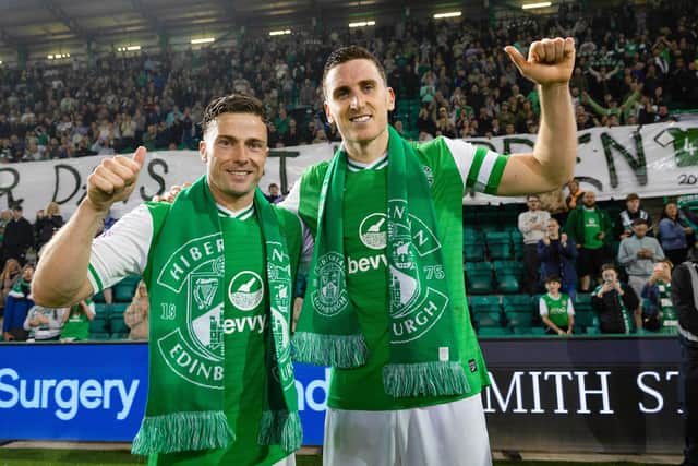 Departing Hibs legnds Lewis Stevenson (left) and Paul Hanlon at full time after a 3-0 win over Motherwell on their last appearance at Easter Road. (Photo by Ross Parker / SNS Group)
