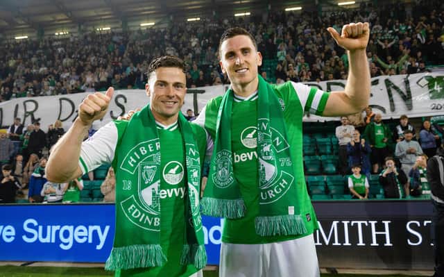 Departing Hibs legnds Lewis Stevenson (left) and Paul Hanlon at full time after a 3-0 win over Motherwell on their last appearance at Easter Road. (Photo by Ross Parker / SNS Group)
