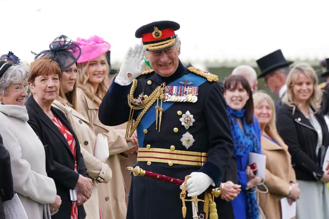 King Charles III meeting guests after a ceremony where he presented new Standards and Colours to the Royal Navy; the Life Guards of the Household Cavalry Mounted Regiment.