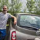 Fraser Thomson and the motor which will be rammed to the rafters with equipment as he heads to Harris and the five-star Amhuinnsuidhe Castle Estate, where he will be working for two months as a ghillie. Picture: Nigel Duncan