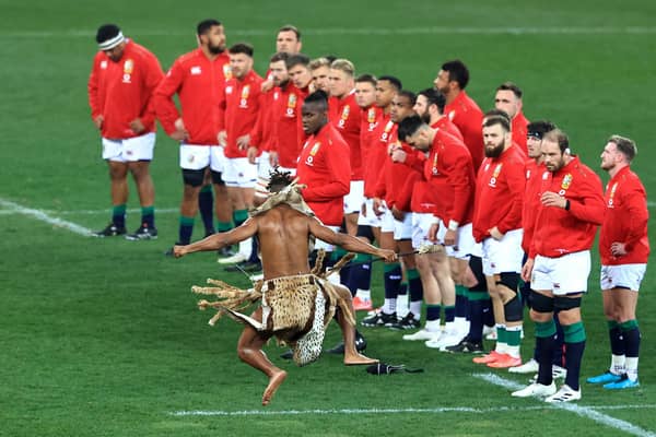 The British & Irish Lions team are challenged by a Zulu warrior prior to the second Test match defeat by South Africa in Cape Town. Picture: David Rogers/Getty Images