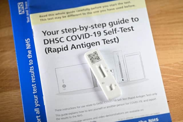 A Covid-19 Lateral Flow (LFT) self-test kit, containing a SARS-CoV-2 Antigen Rapid Test. Photo by JUSTIN TALLIS/AFP via Getty Images