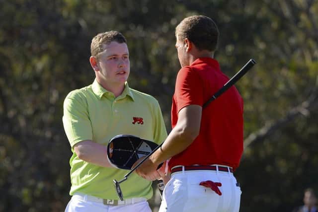 Bob MacIntyre shakes hands with Cameron Champ after beating the American 6&4 in a singles  match in the 2017 Walker Cup in Los Angeles. Picture: Robert Laberge/Getty Images.