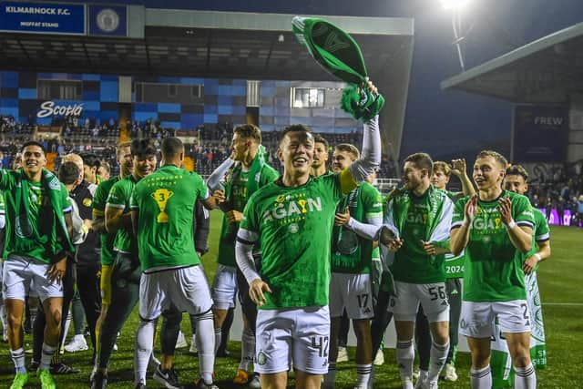 Celtic captain Callum McGregor leads the celebrations at full-time after his side clinched the league title with a 5-0 win over Kilmarnock at Rugby Park. (Photo by Rob Casey / SNS Group)