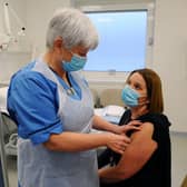 A nurse administers a Covid vaccine at a hospital. Picture: Michael Gillen