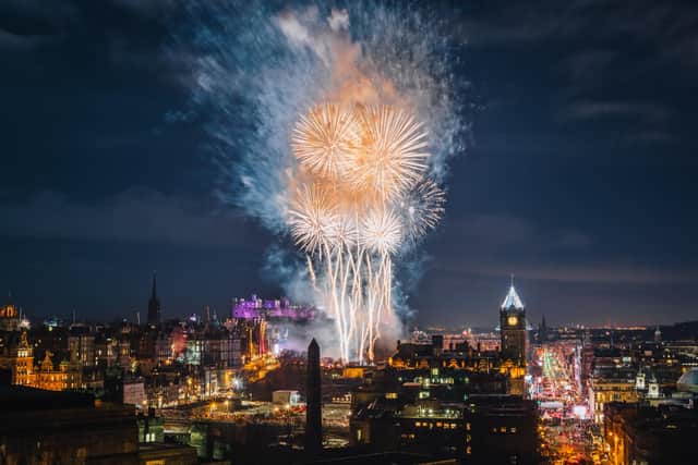 Vibrant fireworks explode above Edinburgh Castle during the Hogmanay New Year celebrations