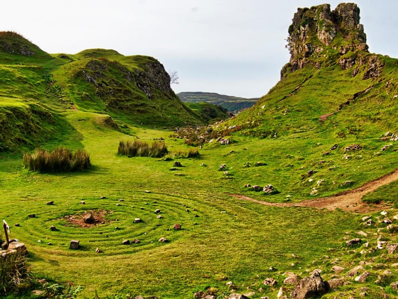 The Fairy Glen can be found on the hills above Uig village. Described as one of the Isle of Skye's 'most enchanting locations', the area catches your attention as the unusual 'off-the-beaten-path' bumpy terrain stands out from the surrounding fields.