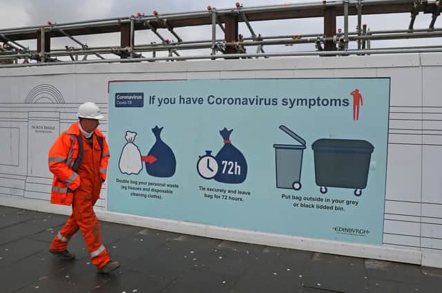 A coronavirus advice sign on North Bridge in Edinburgh