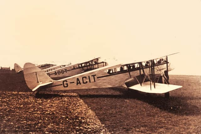 Ted Fresson's first DH 84 Dragon with his other aircraft on Longman Field in Inverness. Picture: High Life Scotland