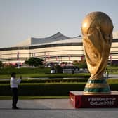 A World Cup trophy replica in front of the Al-Bayt Stadium in al-Khor ahead of the Qatar 2022 World Cup. (Photo by KIRILL KUDRYAVTSEV/AFP via Getty Images)