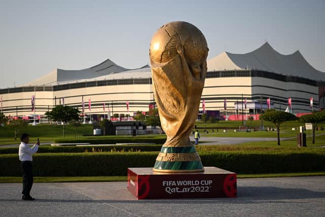 A World Cup trophy replica in front of the Al-Bayt Stadium in al-Khor ahead of the Qatar 2022 World Cup. (Photo by KIRILL KUDRYAVTSEV/AFP via Getty Images)
