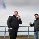 Allan Logan, Bruichladdich Distillery production director (left), samples a glass of The Regeneration Project with farmer Andrew Jones. Picture: Bruichladdich Distillery