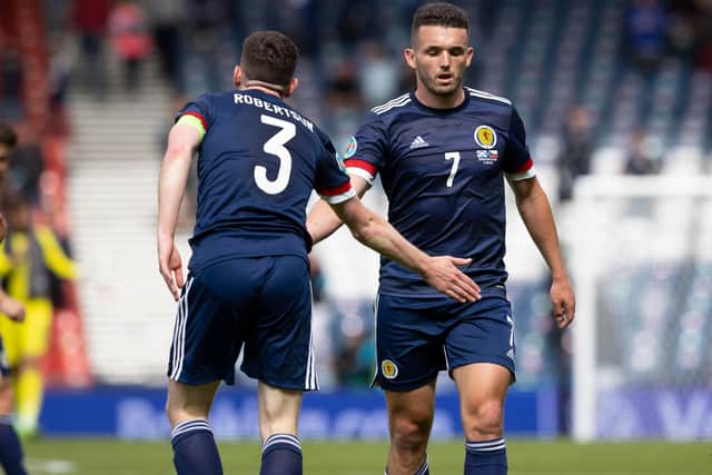 A disappointed John McGinn with Scotland captain Andy Robertson at full time of the 2-0 defeat to Czech Republic at Hampden in the Euro 2020 opener (Photo by Alan Harvey / SNS Group)