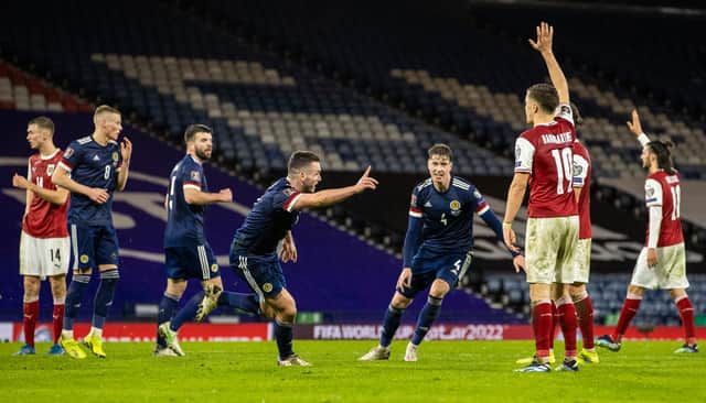 John McGinn celebrates after his overhead kick earned Scotland a 2-2 draw against Austria at Hampden (Photo by Alan Harvey / SNS Group)
