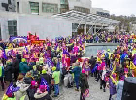 Teachers hold a rally outside the Scottish Parliament on a strike day in November last year
