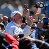 Pope Francis waves from the popemobile car as he makes a tour of St. Peter's square following the Easter Sunday mass. Picture: Andreas Solaro/AFP via Getty Images