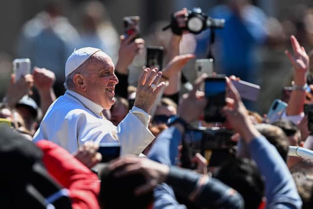 Pope Francis waves from the popemobile car as he makes a tour of St. Peter's square following the Easter Sunday mass. Picture: Andreas Solaro/AFP via Getty Images