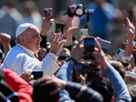 Pope Francis waves from the popemobile car as he makes a tour of St. Peter's square following the Easter Sunday mass. Picture: Andreas Solaro/AFP via Getty Images