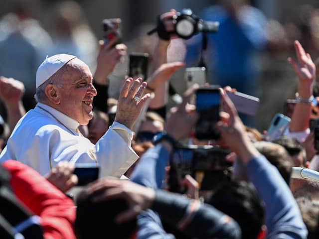 Pope Francis waves from the popemobile car as he makes a tour of St. Peter's square following the Easter Sunday mass. Picture: Andreas Solaro/AFP via Getty Images