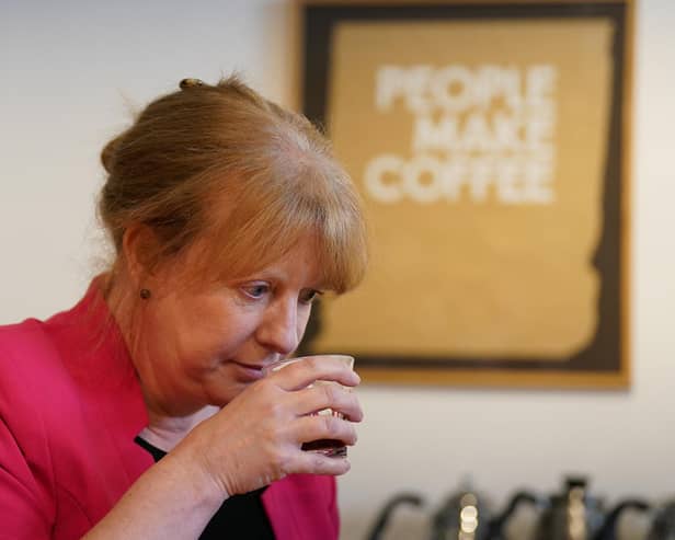Deputy First Minister Shona Robison samples coffee during a visit to sustainable coffee roaster Dear Green, in Glasgow, to highlight the Scottish Government's new financial and economic policy commitments
