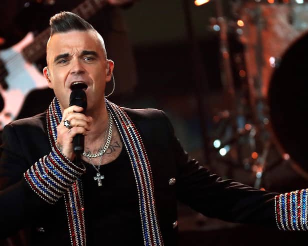 Robbie Williams could drive us willingly back into total lockdown if it meant we could avoid having to listen to his new Christmas song (Picture: Felipe Trueba/pool/Getty Images)
