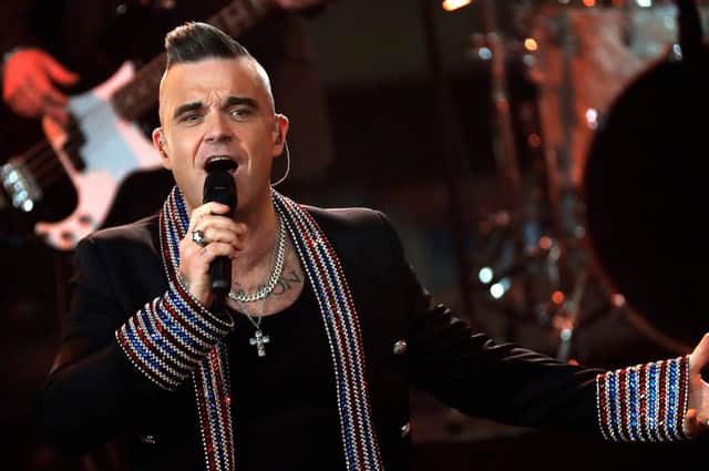 Robbie Williams could drive us willingly back into total lockdown if it meant we could avoid having to listen to his new Christmas song (Picture: Felipe Trueba/pool/Getty Images)