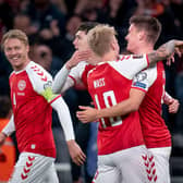 Denmark celebrate their 1-0 victory over Austria in Copenhagen.