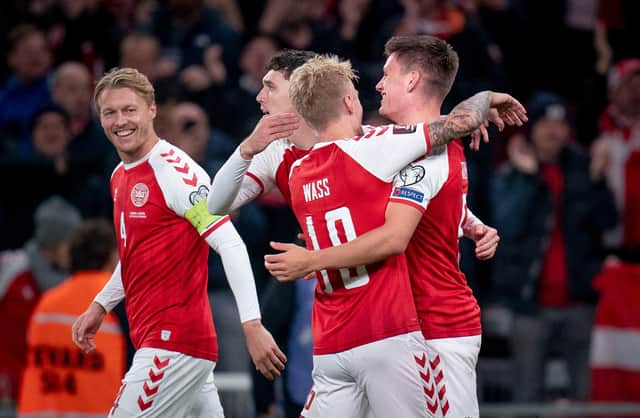 Denmark celebrate their 1-0 victory over Austria in Copenhagen.