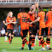 Dundee United's players celebrate after Peter Pawlett put them 4-1 up. Picture: SNS