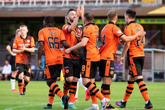 Dundee United's players celebrate after Peter Pawlett put them 4-1 up. Picture: SNS