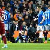 Rangers' Connor Goldson picked up a serious injury against Liverpool.