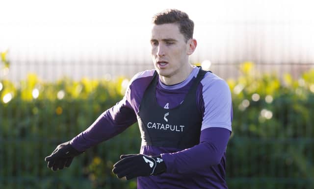 Paul Hanlon is back in Hibs training after illness.