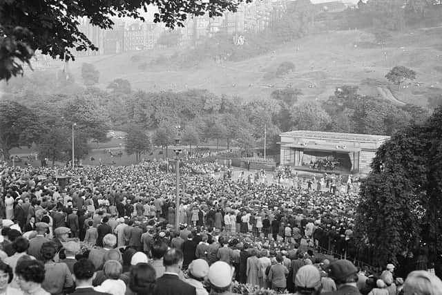Crowds of holiday-makers watch a session of open-air dancing at the Ross Bandstand in Princes Street Gardens, 1950s.