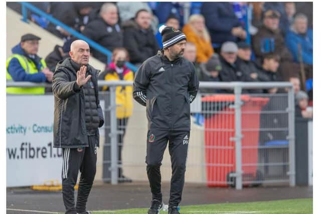Gordon Young (left) on the sidelines with Cove Rangers manager Paul Hartley