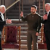 Ukrainian President Volodymyr Zelensky gives a V-for-Victory sign, in the style of Winston Churchill, after addressing politicians in Westminster Hall (Picture: Stefan Rousseau/PA)