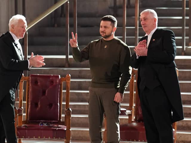 Ukrainian President Volodymyr Zelensky gives a V-for-Victory sign, in the style of Winston Churchill, after addressing politicians in Westminster Hall (Picture: Stefan Rousseau/PA)