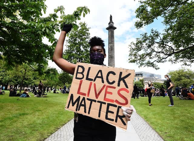A Black Lives Matter protest at Melville Monument in Edinburgh. Should black history be included in the school curriculum?