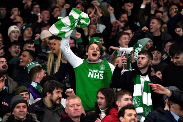 Hibernian fans celebrate during the Premier Sports Cup semi-final match at Ibrox Stadium, Glasgow. They will head to Hampden Park today.