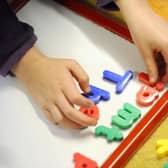 A child at play. More than 8,000 nursery and childcare staff have been absent as a result of mental health issues over the past five years, figures from the Scottish Conservatives claim. Picture: Dominic Lipinski/PA Wire