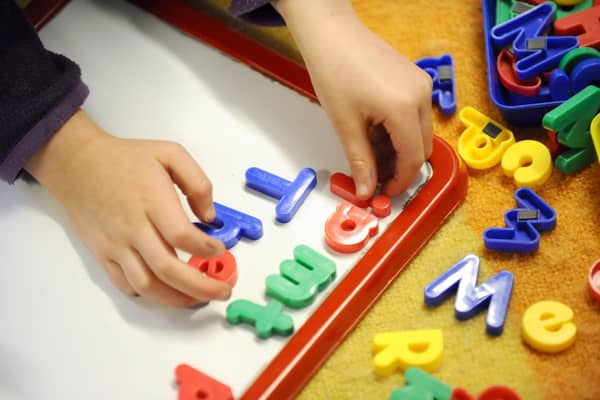 A child at play. More than 8,000 nursery and childcare staff have been absent as a result of mental health issues over the past five years, figures from the Scottish Conservatives claim. Picture: Dominic Lipinski/PA Wire