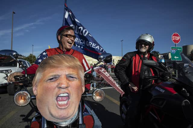 Supporters of Donald Trump held a car parade Saturday from Clackamas to Portland, Oregon (Picture: Paula Bronstein/AP)