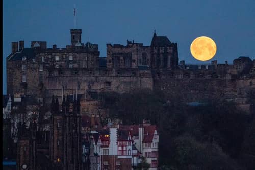 Moon over Edinburgh Castle.