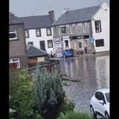 A photograph taken by a local resident in Kincardine shows the High Street completely submerged in water. (Credit: Fife Jammer Locations)